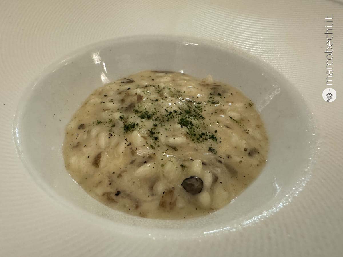 Risotto al tartufo nero e Faraona con gocce di bosco