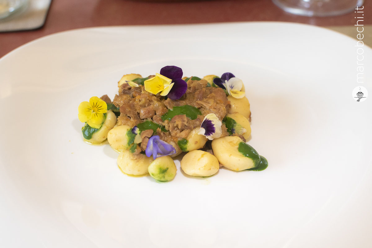 Gnocco con ragu bianco di agnello e spinaci 